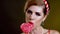 Woman retro style lick lollipop confection portrait