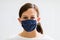 Woman In Reusable Cloth Face Mask