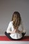 Woman in reverse namaste pose during meditation