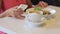 Woman or reviewer eating lunch at restaurant