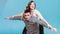 Woman riding piggyback on man. Happy couple.