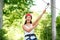 Woman riding on a zip line