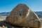 Woman Rock Climbing a Large Boulder