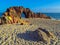 Woman on rocky beach