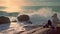 Woman on rocky coast of atlantic ocean