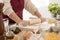 Woman rolling the dough