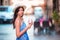 Woman in Rome with coffee to go on vacation travel. Smiling happy caucasian girl having fun laughing on Italian sidewalk