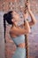 Woman, rope climb and fitness, muscle and strong with upper body workout at gym, active lifestyle and training for