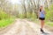 Woman runner drinking green smoothie