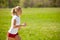 Woman runner runs - workout in spring