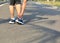 Woman runner sports injured knee