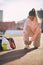 Woman runner in sportswear prepare for training on stadium