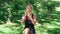 Woman runner warm up leg muscles exercising in park. Fitness woman