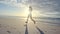 Woman running along the beach in morning