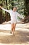 Woman running along country lane