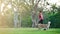 Woman running with a dog in the park