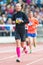 Woman running the final stretch at Stockholm Stadion