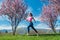 Woman running for fitness on a spring day