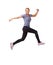 Woman, running and jump in studio for fitness, workout and training celebration, energy or achievement. Excited portrait