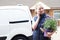 Woman Running Mobile Gardening Business Using Mobile Phone