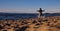 Woman running on sandy beach