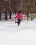 Woman running in snow