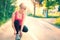 Woman running workout on spring sunny sunset