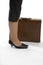 Woman\'s feet with brief case