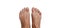 Woman\'s feet on white.