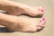 Woman\'s foots with a ring on a toe