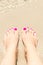 Woman\'s foots with a ring on a toe
