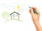 Woman\'s hand drawing the dream home