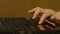 A Woman`s hand with the fingers on a laptop mousepad. Woman`s hand using laptop mouse