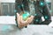 woman\\\'s hand holding a security shield icon hologram. Data protection concept and technology.