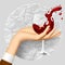 Woman`s hand holding a wineglass with splashed wine on crumpled