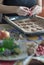 Woman\'s hand, preparing the Christmas table