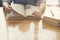 woman\'s hand reading book on wooden table