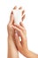 Woman\'s hands with care cream tube
