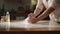 a woman& x27;s hands engaged in the cleaning process, with the tabletop gleaming after being polished. The composition