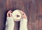 Woman\'s hands holding cup of coffee, toned photo