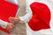 Woman`s hands holding documents against Japan flag background. Education abroad