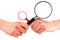 Woman\'s hands holds two magnifying glasses