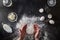 Woman\'s hands knead dough on table with flour