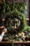 Woman\\\'s hands making an ecological Christmas holiday wreath