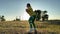 Woman\'s Intense Workout in Serene Rural Setting in Golden Hour Sun