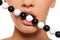 Woman\'s lips with black and white beads