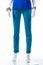 Woman\'s plain turquoise pants.