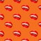 A woman`s smile on an orange background. Bright background with red lips. White, even teeth. Pattern