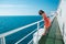 A woman is sailing on a cruise ship