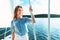 Woman Sailing On Yacht Standing On Deck Enjoying Sea Breeze
